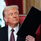 Trump signs order to revise Pentagon’s policy on transgender troops