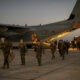 Troops arrive at Guantanamo Bay to prepare migrant detention center