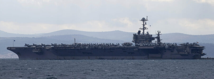 Fighter jet slips off carrier hangar deck in Red Sea, one minor injury