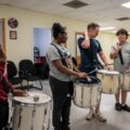 Stick Masters teach Sailors to play percussion instruments [Image 6 of 14]