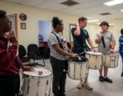 Stick Masters teach Sailors to play percussion instruments [Image 6 of 14]