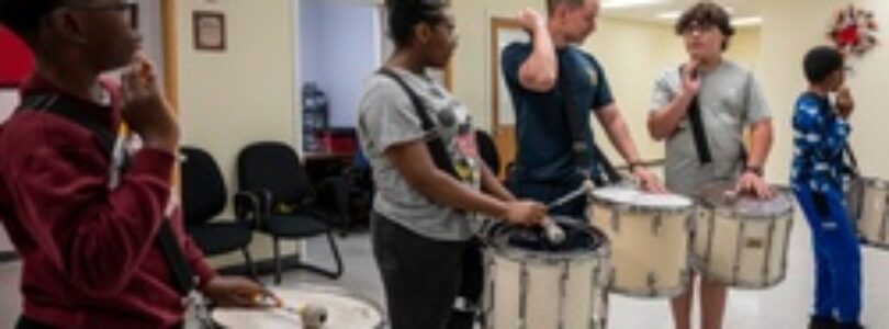 Stick Masters teach Sailors to play percussion instruments [Image 6 of 14]