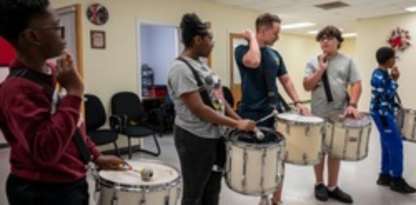 Stick Masters teach Sailors to play percussion instruments [Image 6 of 14]