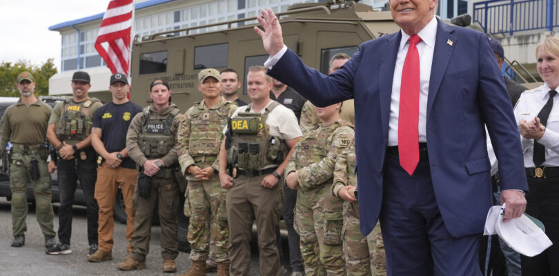 Trump touts tough-on-crime mantra during visit to Guard troops in DC