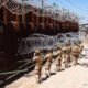 Hundreds of Marines, sailors fortify US-Mexico border wall in Arizona