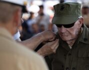 He was bayoneted in Guam. Shot on Iwo. Now, at 100, he is a sergeant.