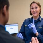 Lt. Amber Martz conducts a physical [Image 3 of 5]