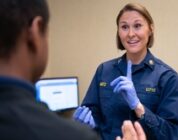 Lt. Amber Martz conducts a physical [Image 3 of 5]
