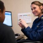 Lt. Amber Martz conducts a medical history interview [Image 2 of 5]