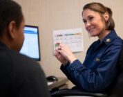 Lt. Amber Martz conducts a medical history interview [Image 2 of 5]