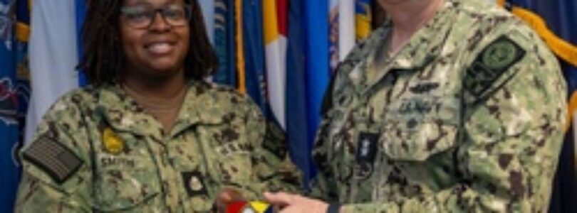 RADM Waters gives Bravo Zulu belt buckles to Chaplains [Image 7 of 8]