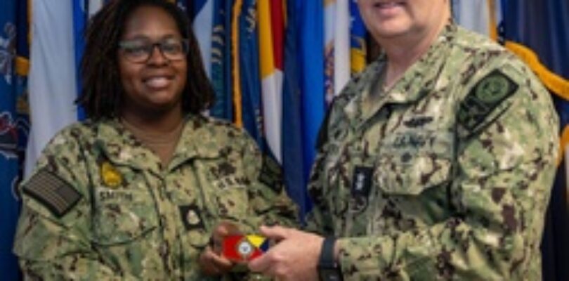 RADM Waters gives Bravo Zulu belt buckles to Chaplains [Image 7 of 8]