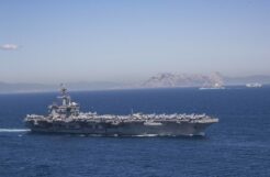 Iran puts ‘fingers on trigger’ as US armada arrives in Middle East