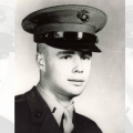 Refusing evacuation, this Marine packed dirt into his wound and continued to fight