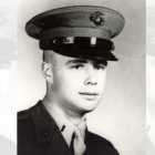 Refusing evacuation, this Marine packed dirt into his wound and continued to fight