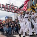 Future Sailors and Navy recruiters from Navy Talent Acquisition Group Mid-America take part in the 68th Annual Cardinal Company event [Image 2 of 3]