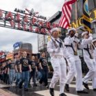 Future Sailors and Navy recruiters from Navy Talent Acquisition Group Mid-America take part in the 68th Annual Cardinal Company event [Image 2 of 3]