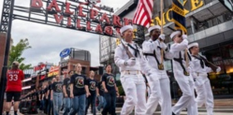 Future Sailors and Navy recruiters from Navy Talent Acquisition Group Mid-America take part in the 68th Annual Cardinal Company event [Image 2 of 3]