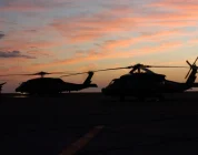 Navy’s ‘dinosaur’ carrier delivery plane flies into sunset