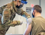 Trump promised redemption for troops who refused COVID shots. A year later, many are still waiting.