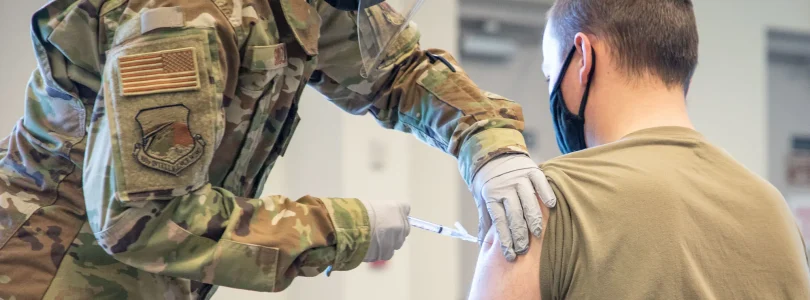 Trump promised redemption for troops who refused COVID shots. A year later, many are still waiting.