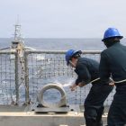 US destroyer practices at-sea drone refueling