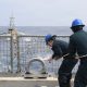 US destroyer practices at-sea drone refueling