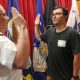 Navy captain gives oath of enlistment to son on last day of service