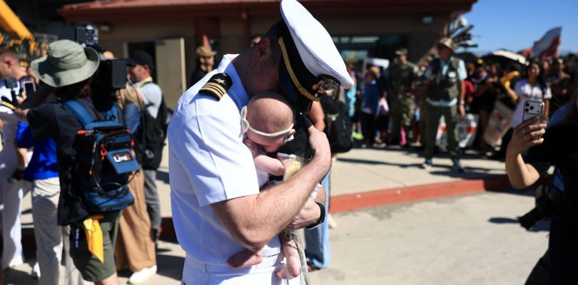 Daddy’s home!: 122 sailors aboard the Abraham Lincoln meet their children for the first time